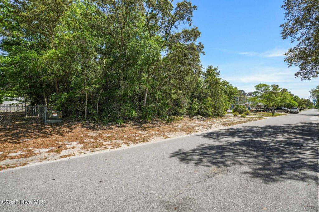 Photo of 48 NE 1st Street, Oak Island, NC 28465 (MLS # 100569919)