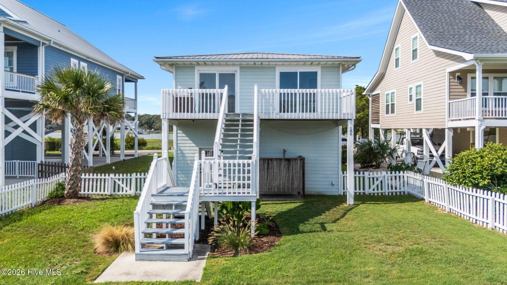 Photo of 186 Sailfish Drive, Holden Beach, NC 28462 (MLS # 100599508)