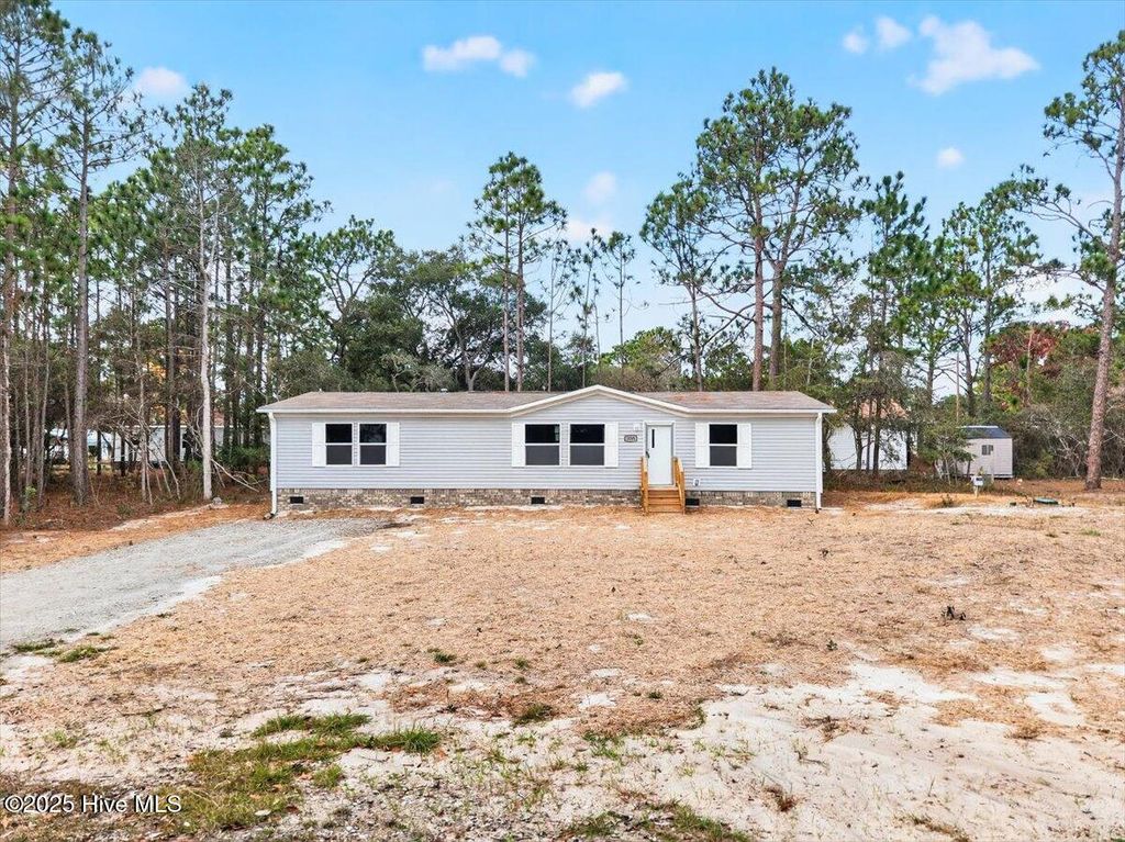 Photo of 3080 Cross Street SW, Shallotte, NC 28470 (MLS # 100544292)