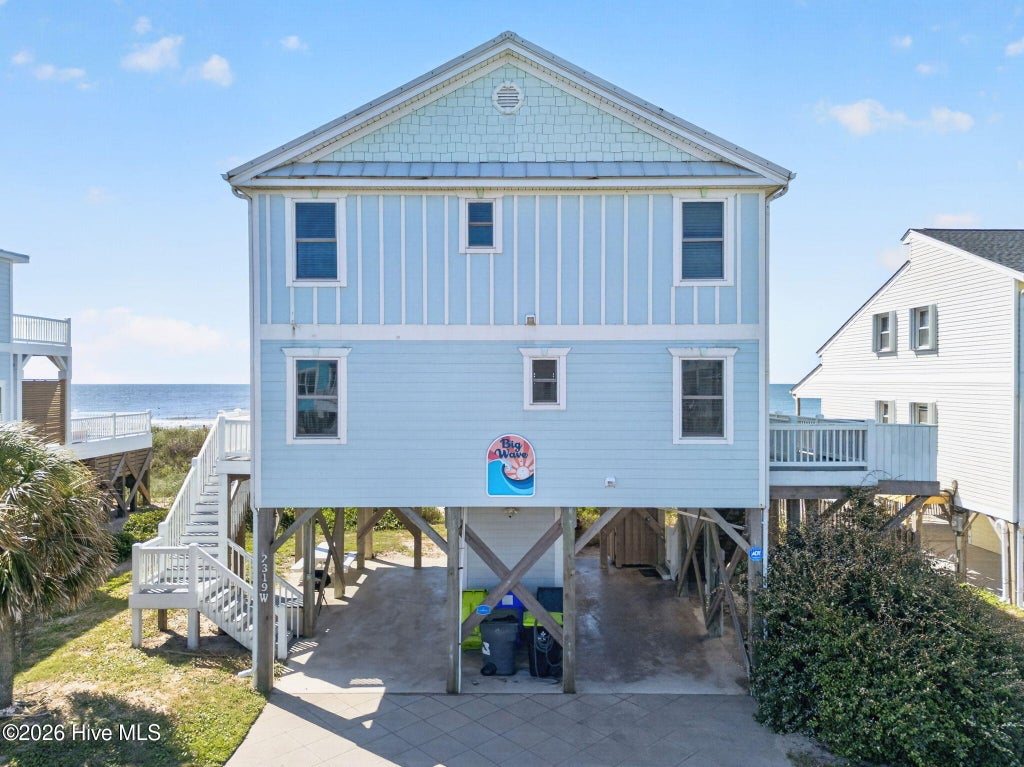 Photo of 2319 W Beach Drive, Oak Island, NC 28465 (MLS # 100602439)