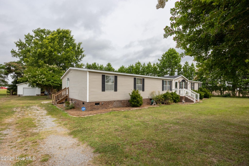 Photo of 6321 Nc 42 Highway E, Elm City, NC 27822 (MLS # 100581237)