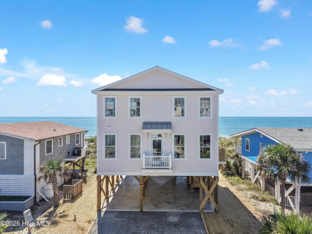 Photo of 5527 E Beach Drive, Oak Island, NC 28465 (MLS # 100603178)