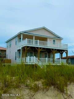 Photo of 5527 E Beach Drive, Oak Island, NC 28465 (MLS # 100603178)