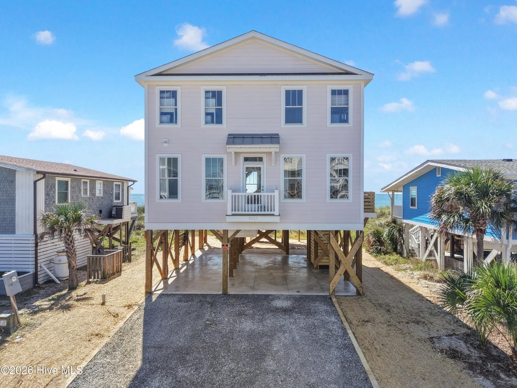 Photo of 5527 E Beach Drive, Oak Island, NC 28465 (MLS # 100603178)