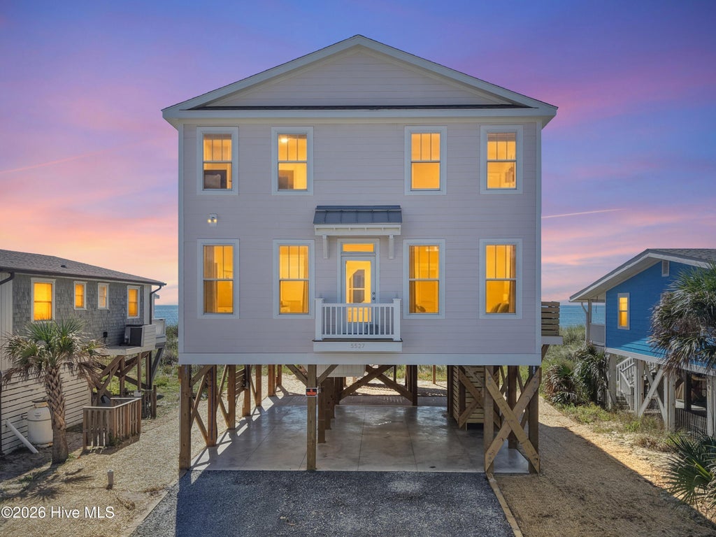 Photo of 5527 E Beach Drive, Oak Island, NC 28465 (MLS # 100603178)