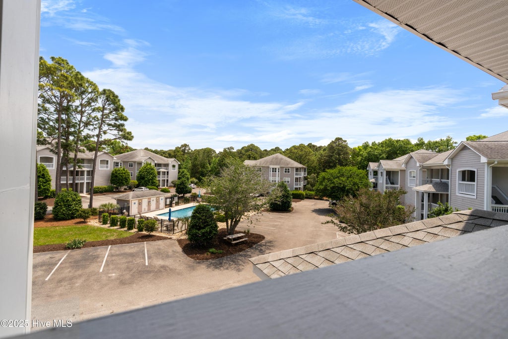 Photo of 3030 Marsh Winds Circle #405, Southport, NC 28461 (MLS # 100603439)