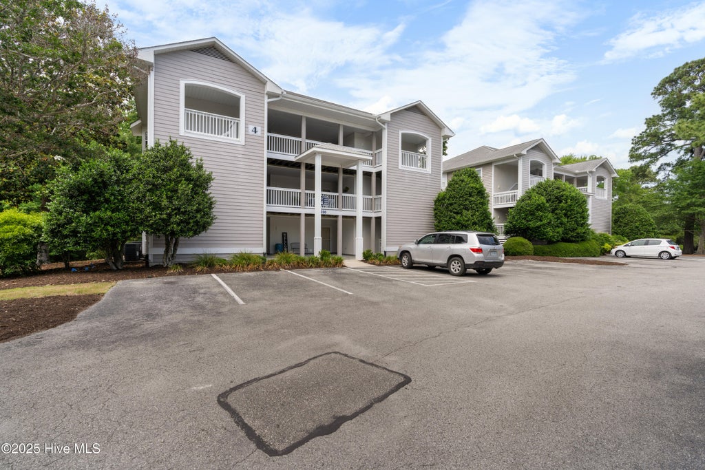 Photo of 3030 Marsh Winds Circle #405, Southport, NC 28461 (MLS # 100603439)