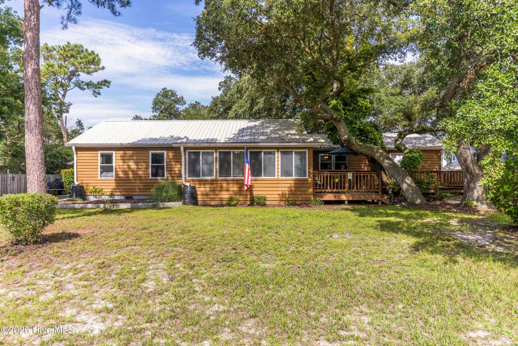 Photo of 105 NW 7th Street, Oak Island, NC 28465 (MLS # 100594310)