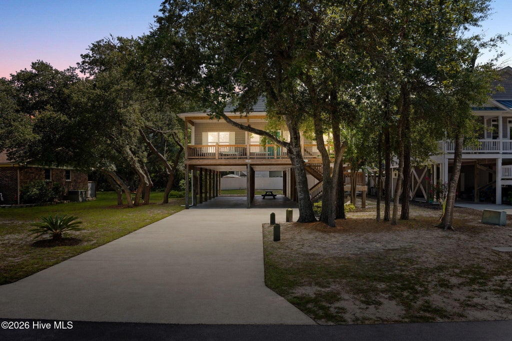 Photo of 110 NW 7th Street, Oak Island, NC 28465 (MLS # 100601636)