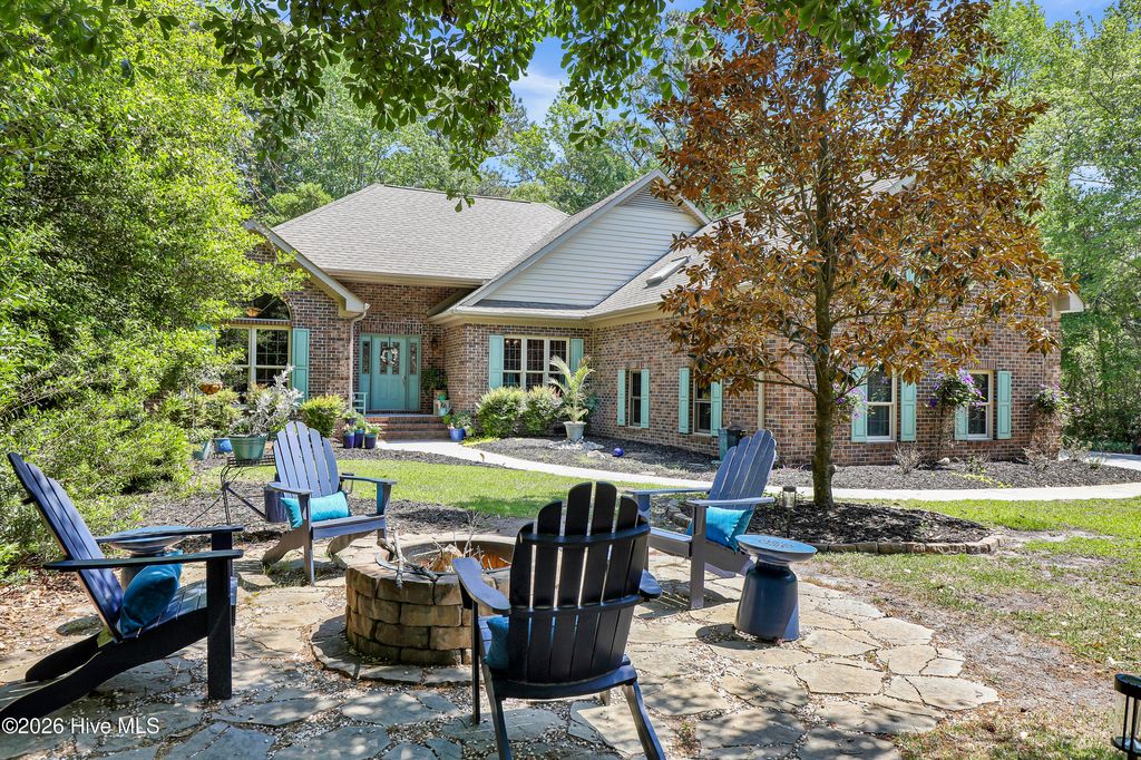 Photo of 719 Sawgrass Road, Hampstead, NC 28443 (MLS # 100570699)