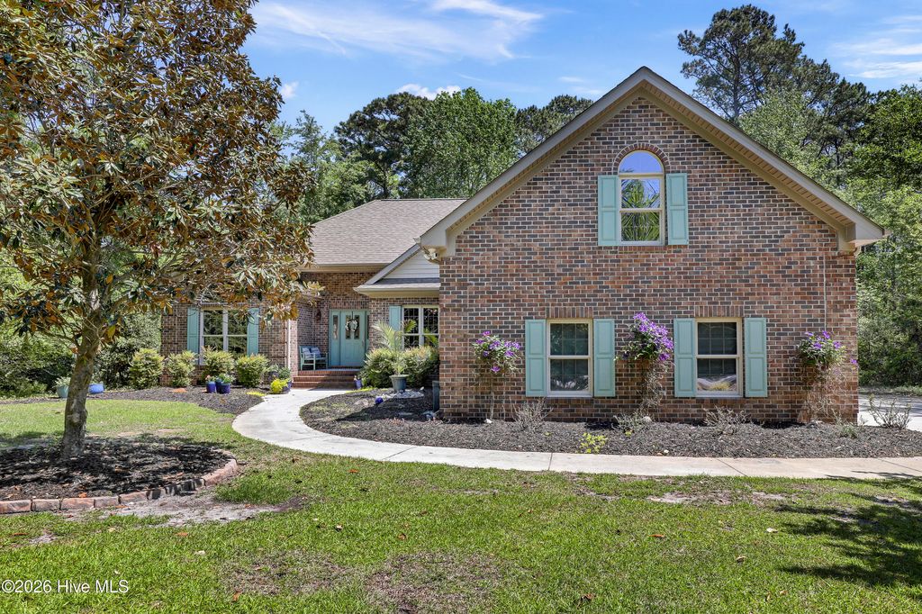 Photo of 719 Sawgrass Road, Hampstead, NC 28443 (MLS # 100570699)