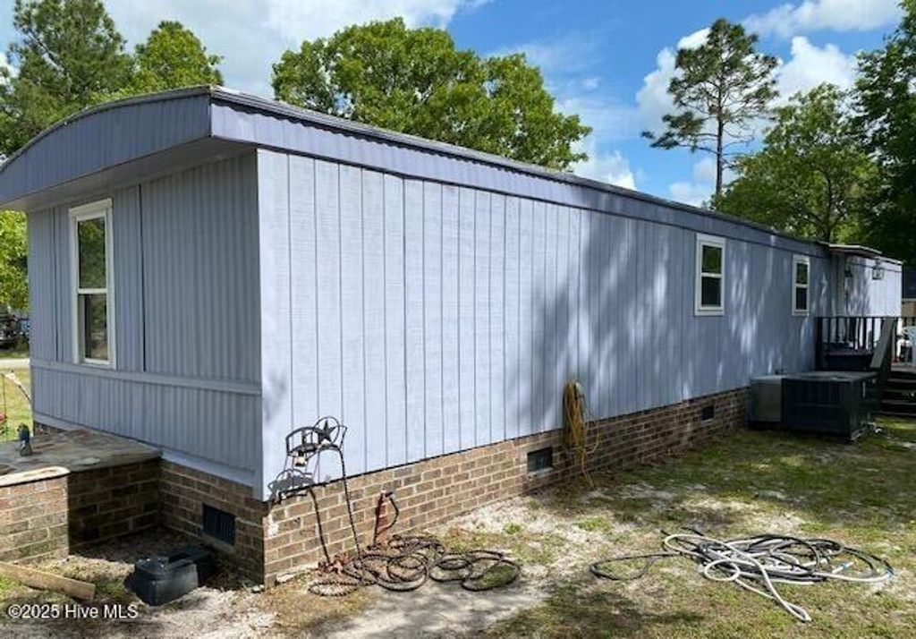 Photo of 198 Sycamore Road, Southport, NC 28461 (MLS # 100538458)