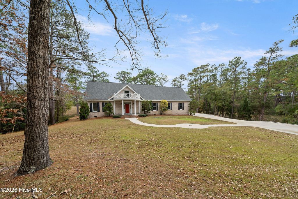 Photo of 6465 Walden Pond Lane, Southport, NC 28461 (MLS # 100557372)