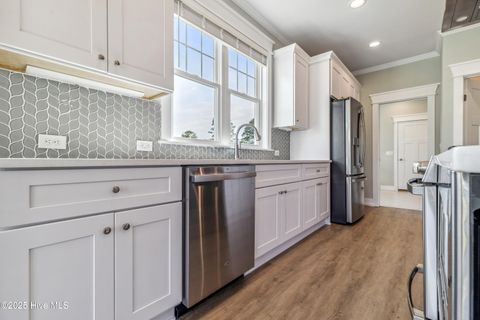 Tiny photo for 114 NE 31st Street, Oak Island, NC 28465 (MLS # 100546665)