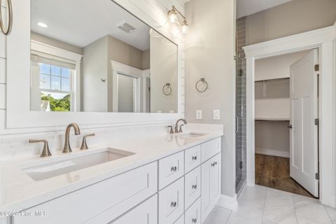 Tiny photo for 114 NE 31st Street, Oak Island, NC 28465 (MLS # 100546665)