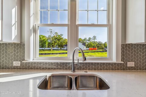 Tiny photo for 114 NE 31st Street, Oak Island, NC 28465 (MLS # 100546665)