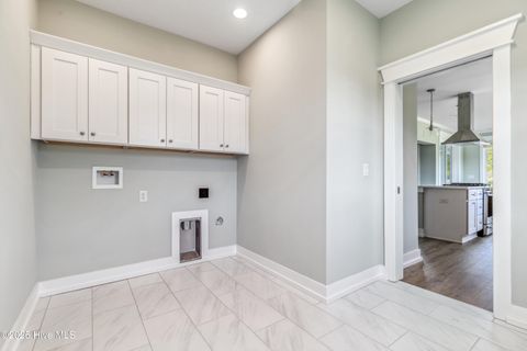 Tiny photo for 114 NE 31st Street, Oak Island, NC 28465 (MLS # 100546665)