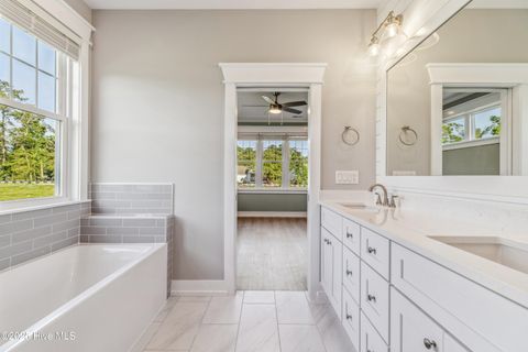 Tiny photo for 114 NE 31st Street, Oak Island, NC 28465 (MLS # 100546665)