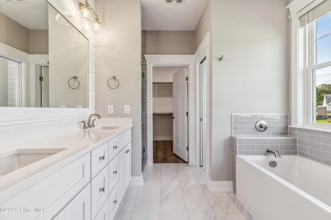 Tiny photo for 114 NE 31st Street, Oak Island, NC 28465 (MLS # 100546665)