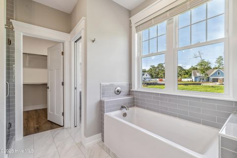 Tiny photo for 114 NE 31st Street, Oak Island, NC 28465 (MLS # 100546665)