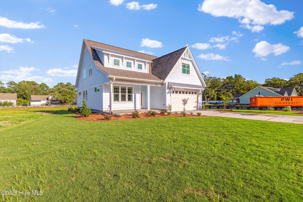 Photo of 114 NE 31st Street, Oak Island, NC 28465 (MLS # 100546665)