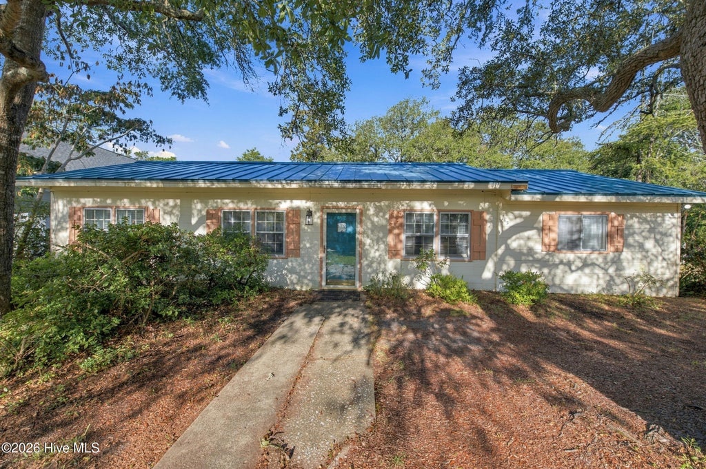 Photo of 143 NW 7th Street, Oak Island, NC 28465 (MLS # 100601733)