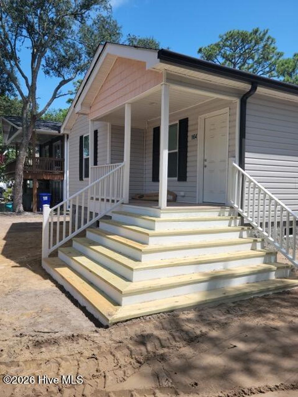 Photo of 113 Pecan Avenue, Lake Waccamaw, NC 28450 (MLS # 100573832)