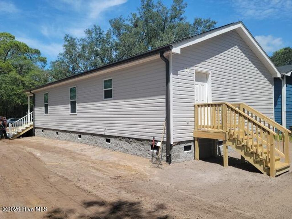 Photo of 113 Pecan Avenue, Lake Waccamaw, NC 28450 (MLS # 100573832)