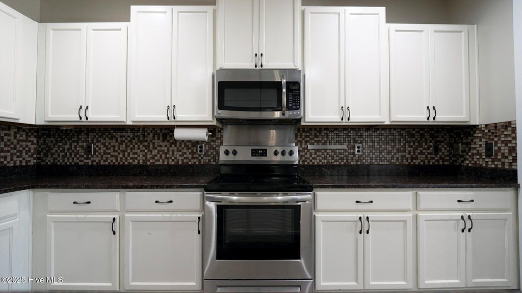 Photo of 402 Ponzer Court N, Holly Ridge, NC 28445 (MLS # 100545040)