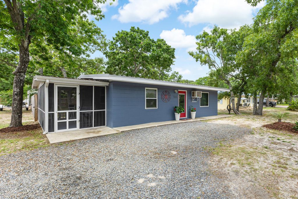 Photo of 105 NE 3rd Street, Oak Island, NC 28465 (MLS # 100531813)