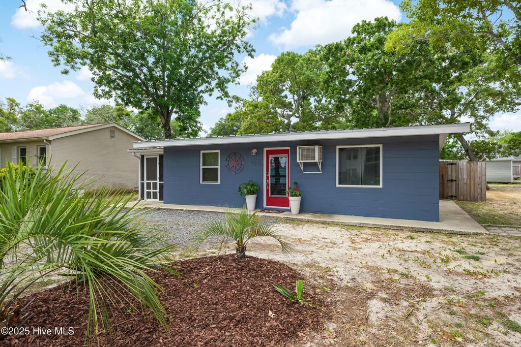 Photo of 105 NE 3rd Street, Oak Island, NC 28465 (MLS # 100531813)