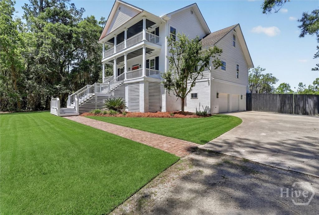 Photo of 447 Sterling Woods Drive, Richmond Hill, GA 31324 (MLS # SA356229)