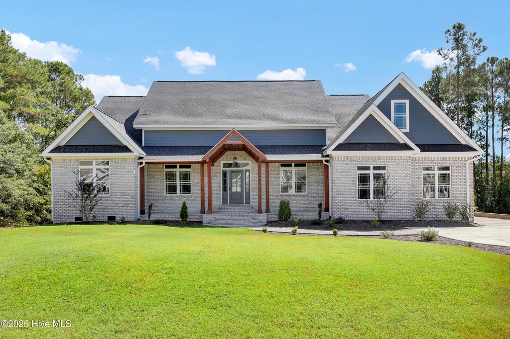Photo of 406 Compass Point, Hampstead, NC 28443 (MLS # 100509859)
