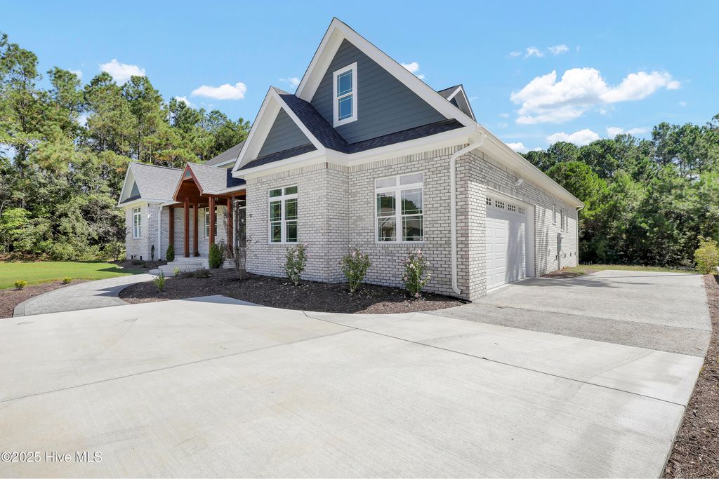 Photo of 406 Compass Point, Hampstead, NC 28443 (MLS # 100509859)