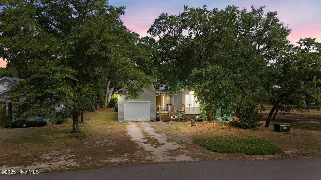 Photo of 124 NW 8th Street, Oak Island, NC 28465 (MLS # 100531343)