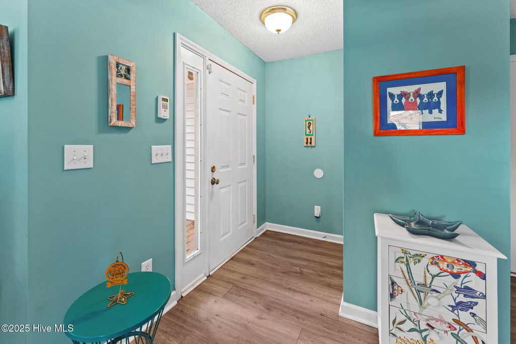 Photo of 124 NW 8th Street, Oak Island, NC 28465 (MLS # 100531343)