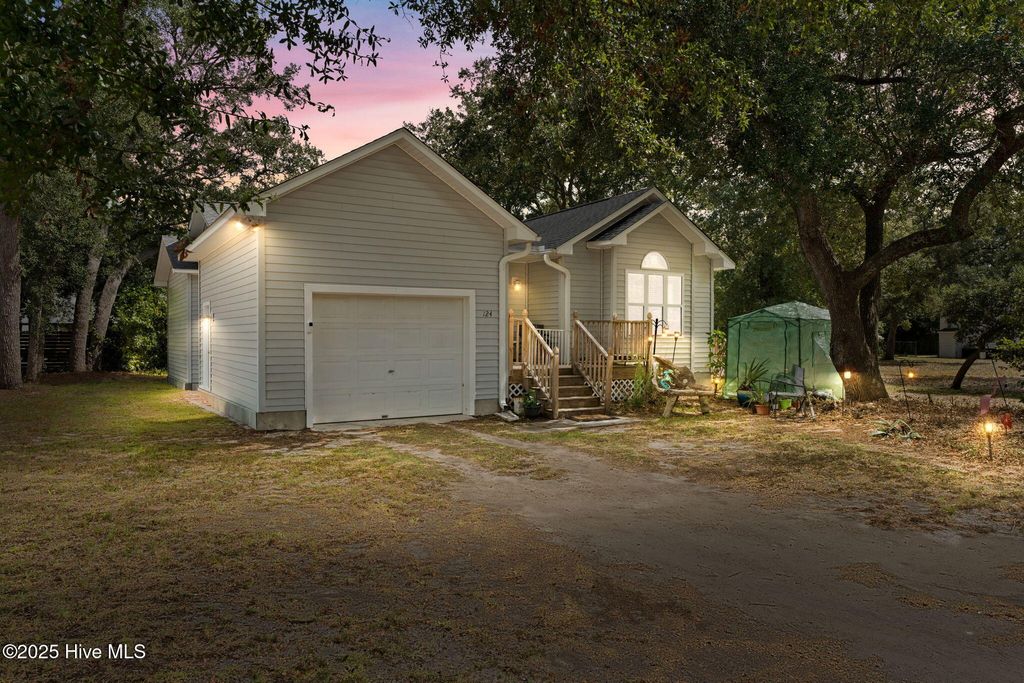 Photo of 124 NW 8th Street, Oak Island, NC 28465 (MLS # 100531343)