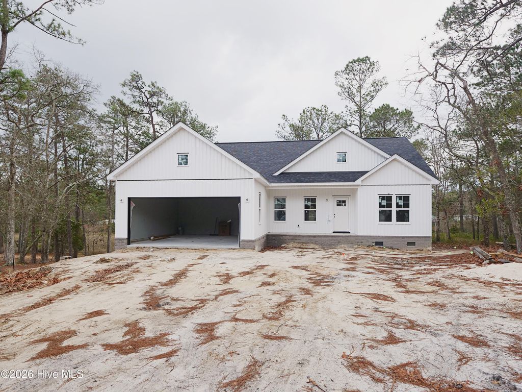 Photo of 3049 River Hills Drive SW, Shallotte, NC 28470 (MLS # 100483564)