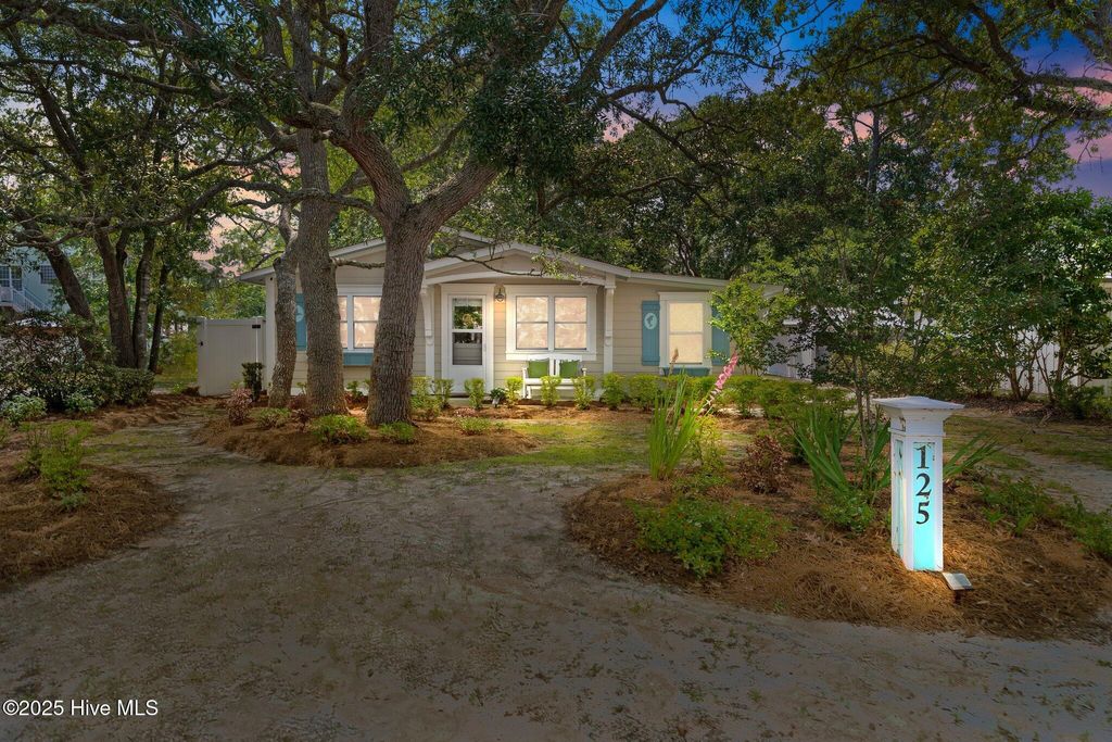 Photo of 125 NE 13th Street, Oak Island, NC 28465 (MLS # 100514497)