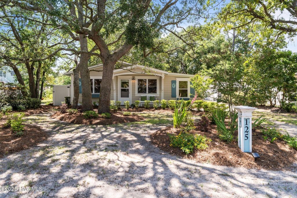 Photo of 125 NE 13th Street, Oak Island, NC 28465 (MLS # 100514497)