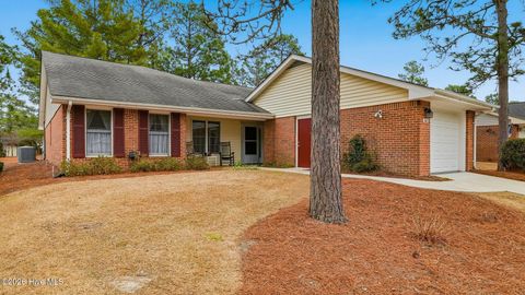 Photo of 560 Pinehurst Trace Drive, Pinehurst, NC 28374 (MLS # 100547907)