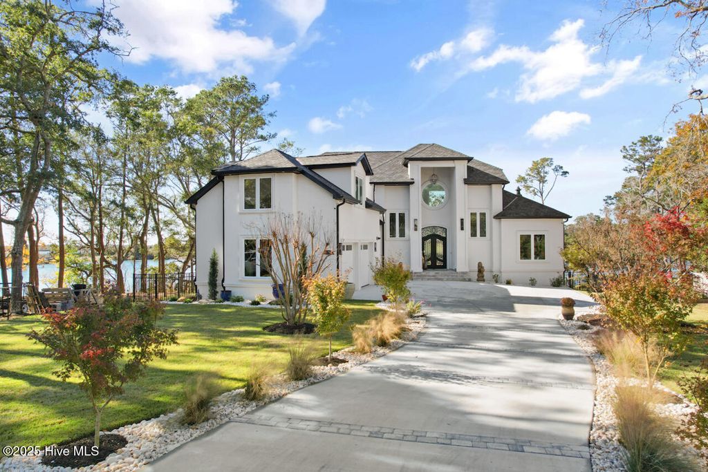 Photo of 411 Lake Shore Drive, Sunset Beach, NC 28468 (MLS # 100531271)