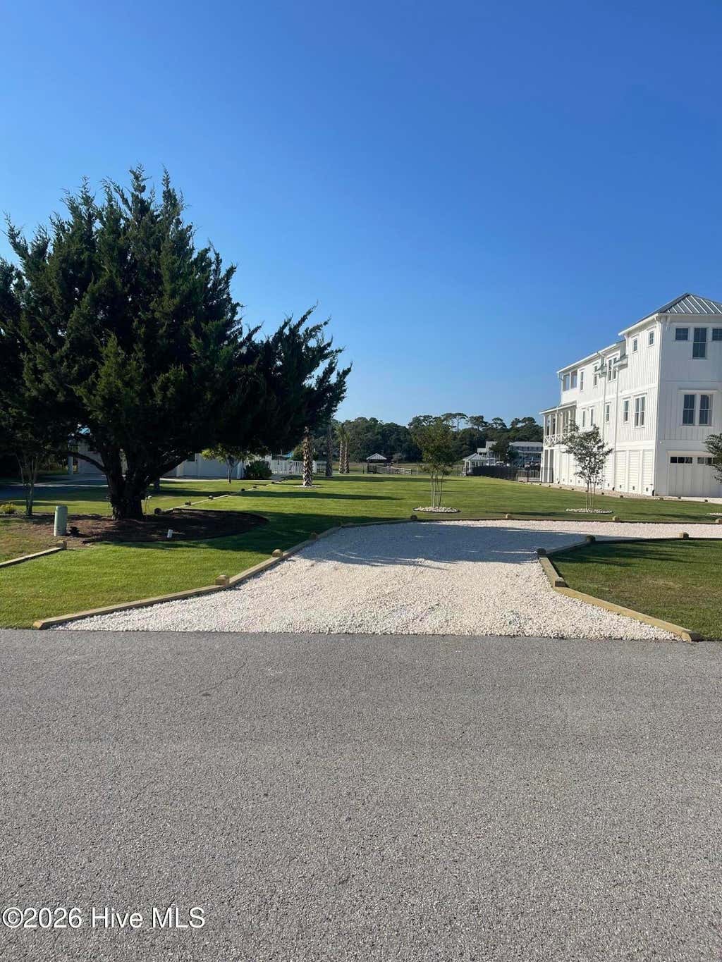Photo of 867 Heron Landing, Holden Beach, NC 28462 (MLS # 100595502)