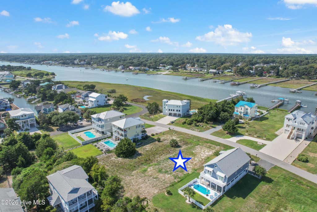 Photo of 867 Heron Landing Wynd, Holden Beach, NC 28462 (MLS # 100595502)