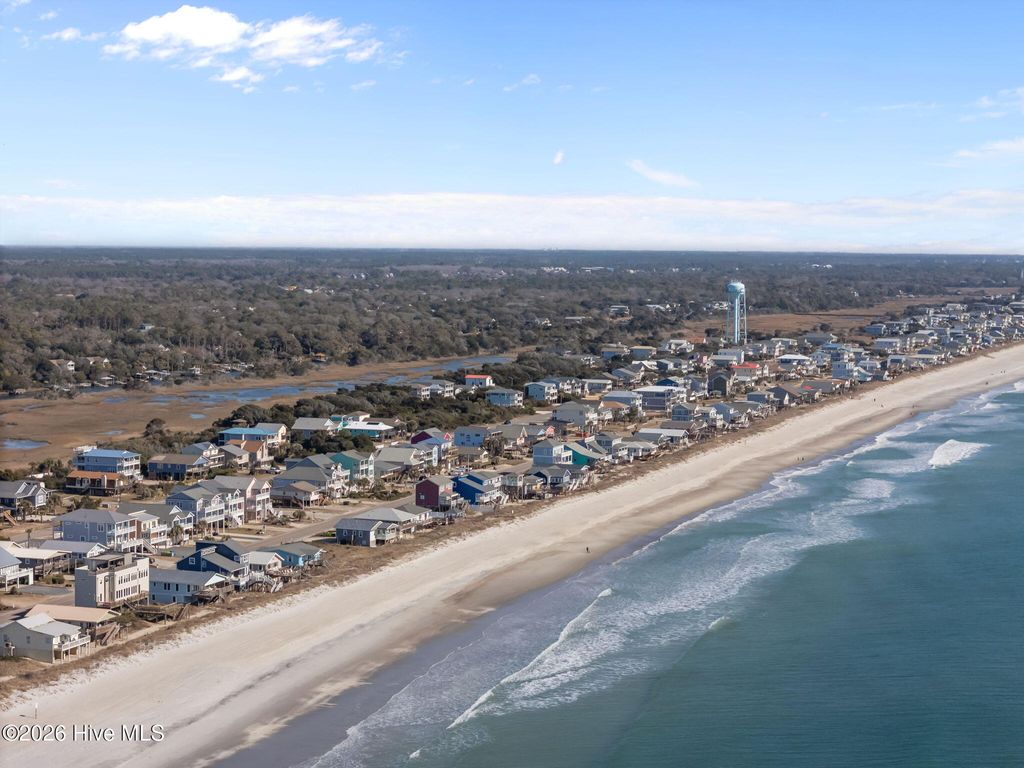 Photo of 1025 W Beach Drive, Oak Island, NC 28465 (MLS # 100553106)