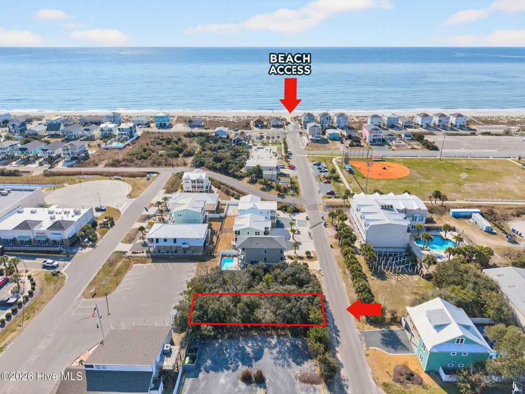 Photo of 116 SE 49th Street, Oak Island, NC 28465 (MLS # 100553914)