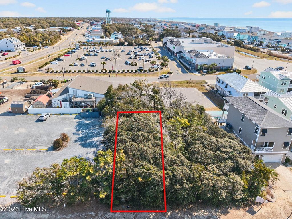 Photo of 116 SE 49th Street, Oak Island, NC 28465 (MLS # 100553914)