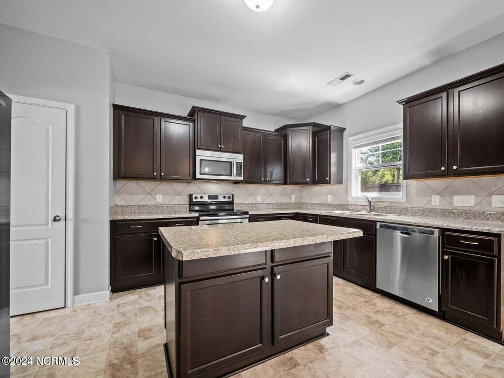 Photo of 113 Katrina Street, Sneads Ferry, NC 28460 (MLS # 100612003)