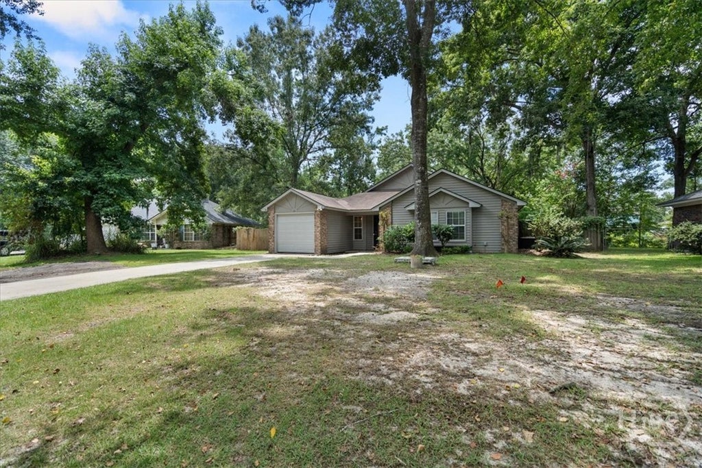 Photo of 66 E Egrets Nest Lane, Richmond Hill, GA 31324 (MLS # SA359810)