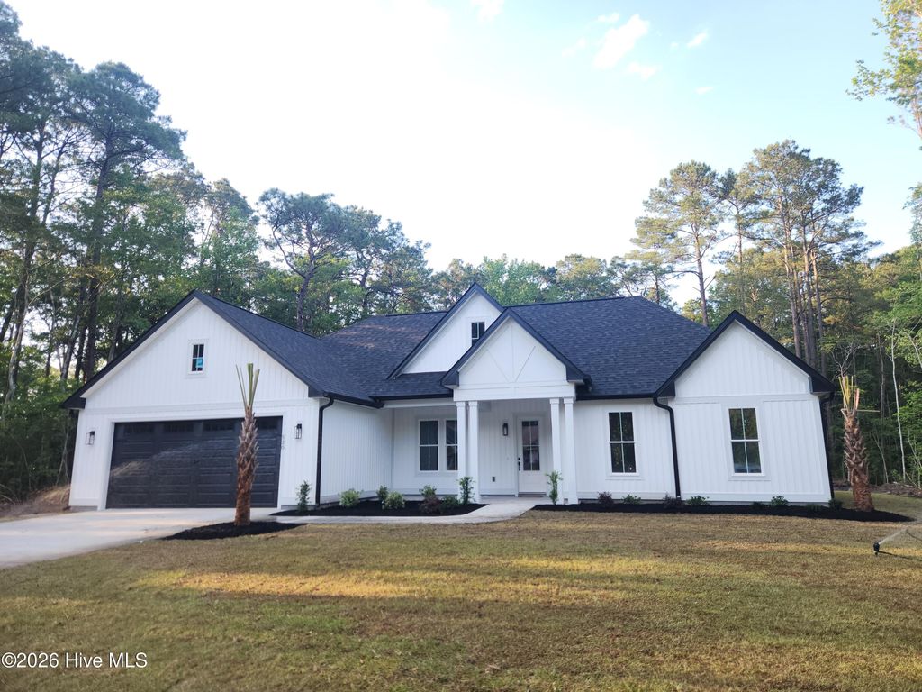 Photo of 520 Boundaryline Drive NW, Calabash, NC 28467 (MLS # 100574028)
